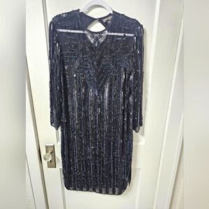 Vintage Carolyne Barton black evening gown with sequence and iridescent beads.